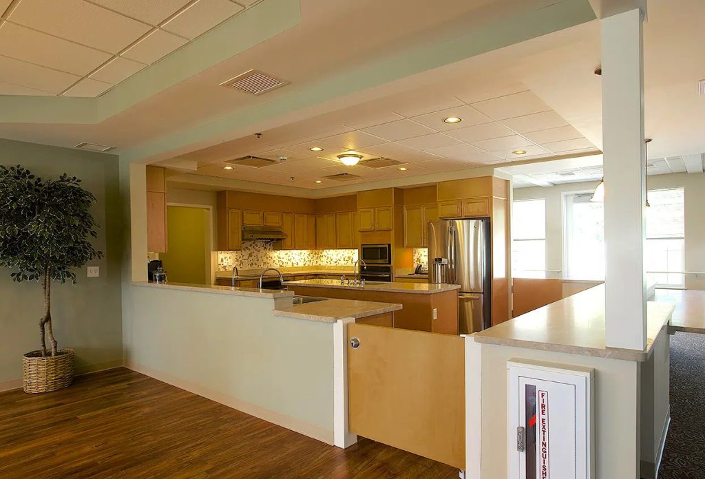 An open kitchen with a breakfast bar